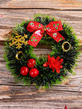 Lataa kuva Galleria-katseluun, Hanging Christmas Wreaths On Shop Windows And Doors