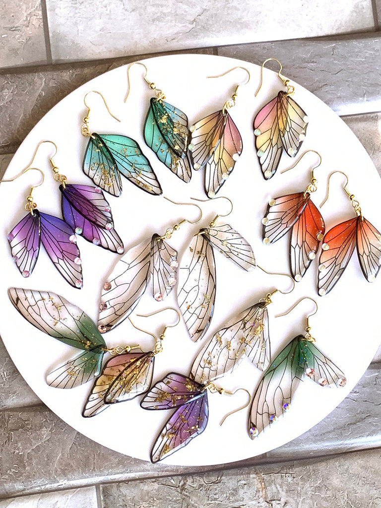 Boucles d'oreilles faites main en forme d'ailes de papillon 