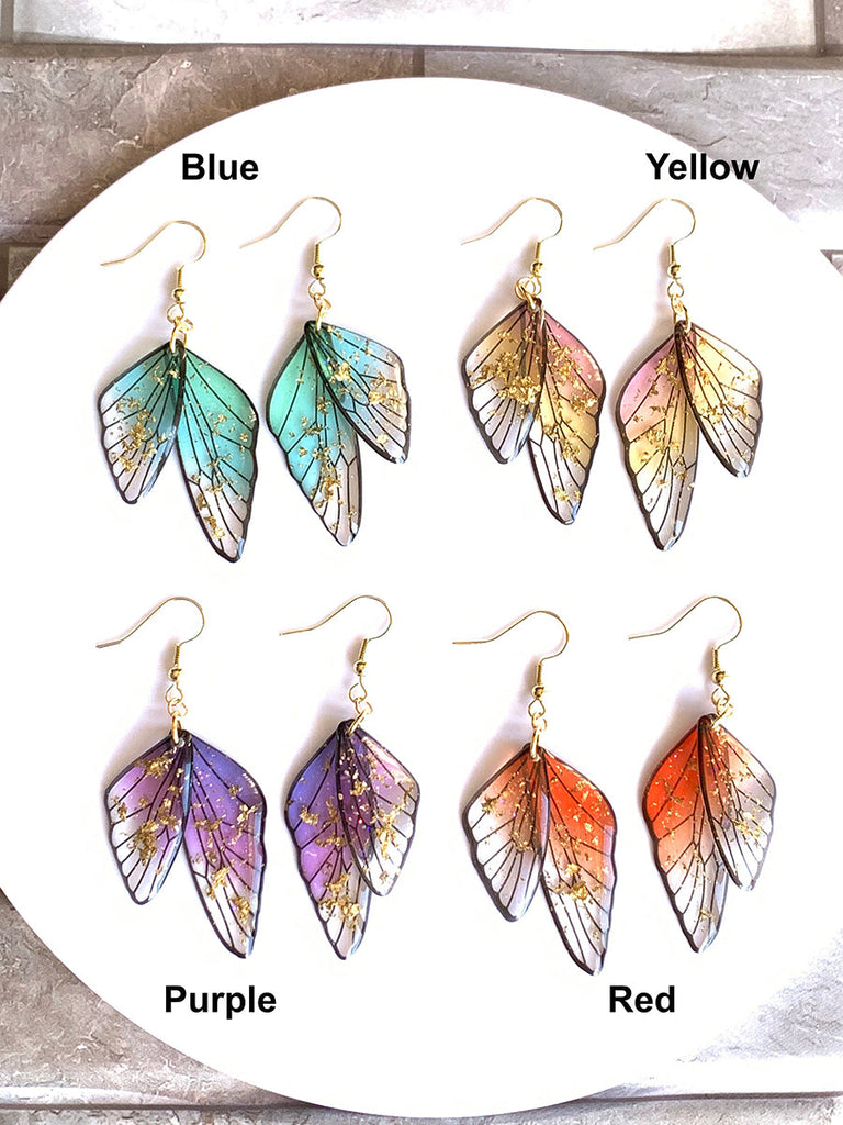 Boucles d'oreilles faites main en forme d'ailes de papillon 