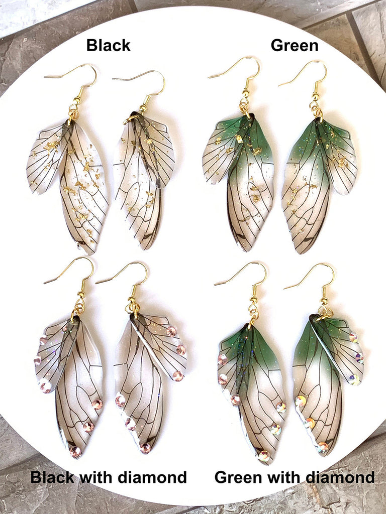 Boucles d'oreilles faites main en forme d'ailes de papillon 