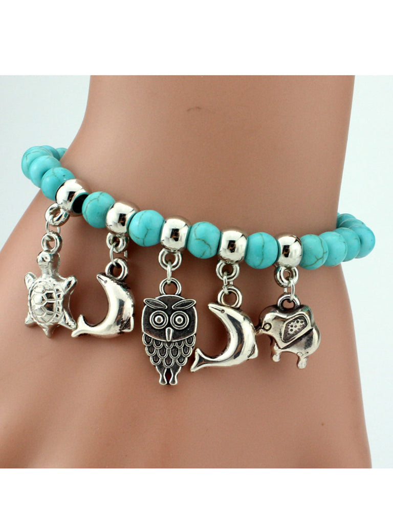 Bracelet éléphant en croix turquoise tendance