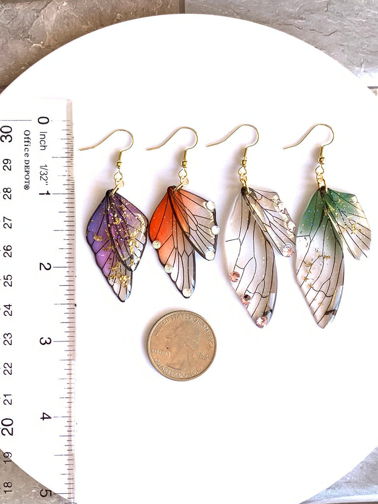 Boucles d'oreilles faites main en forme d'ailes de papillon 