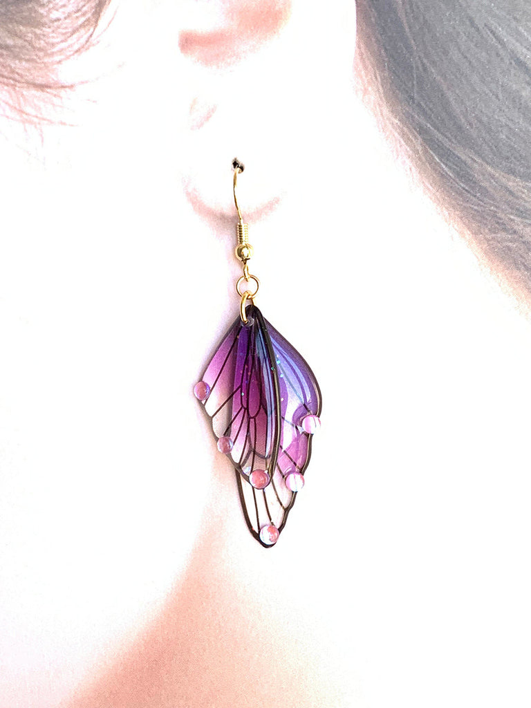 Boucles d'oreilles faites main en forme d'ailes de papillon 