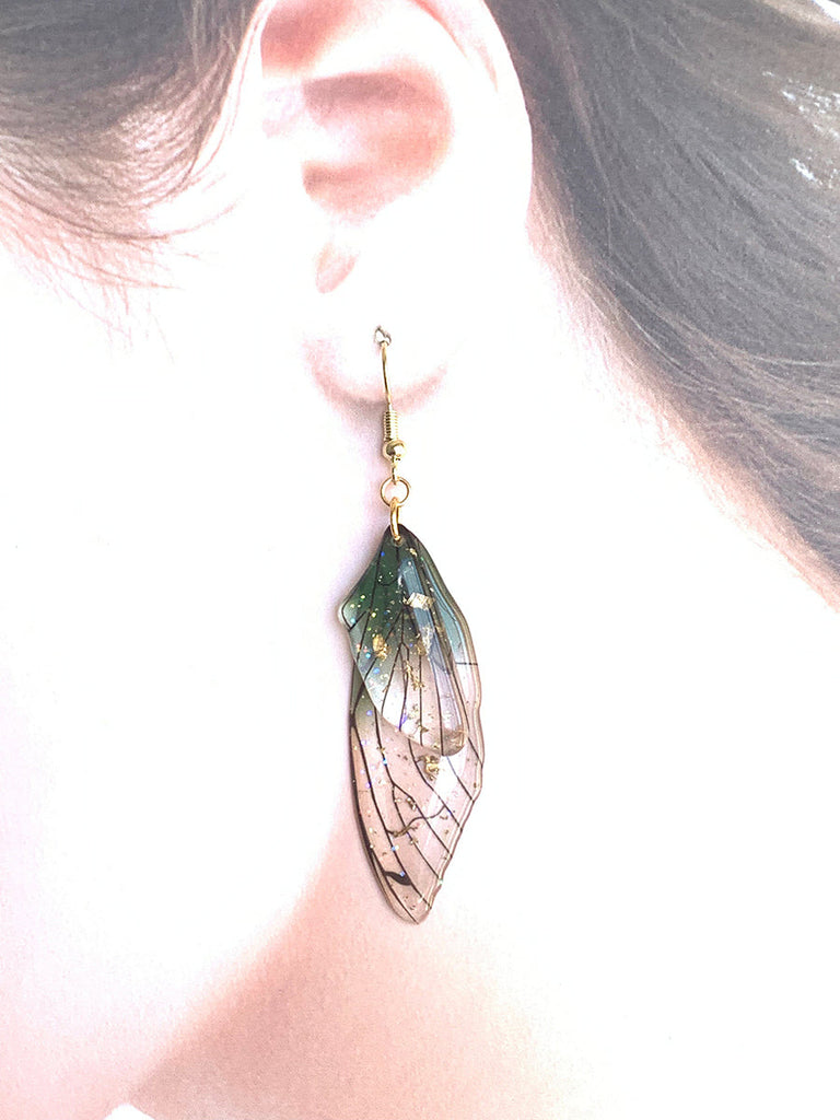 Boucles d'oreilles faites main en forme d'ailes de papillon 