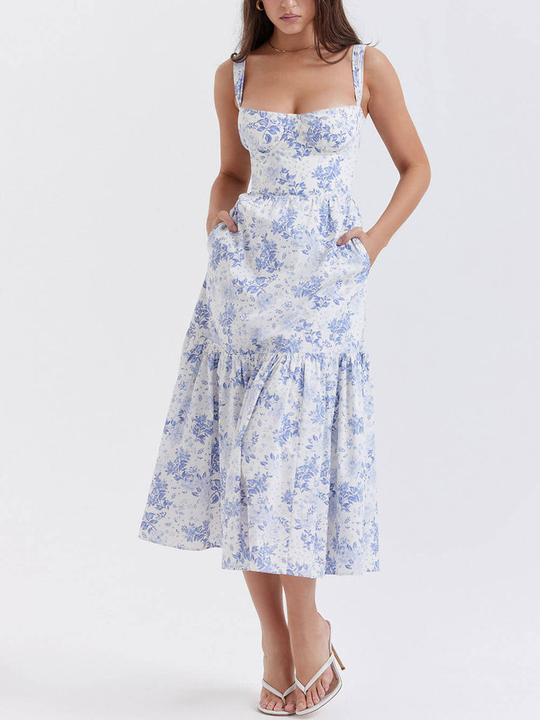 Robe mi-longue fleurie à bretelles et ourlet en A