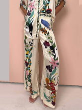 Indlæs billede til gallerivisning Satin Unique Print Elastic Waist Pocketed Wide Leg Pants