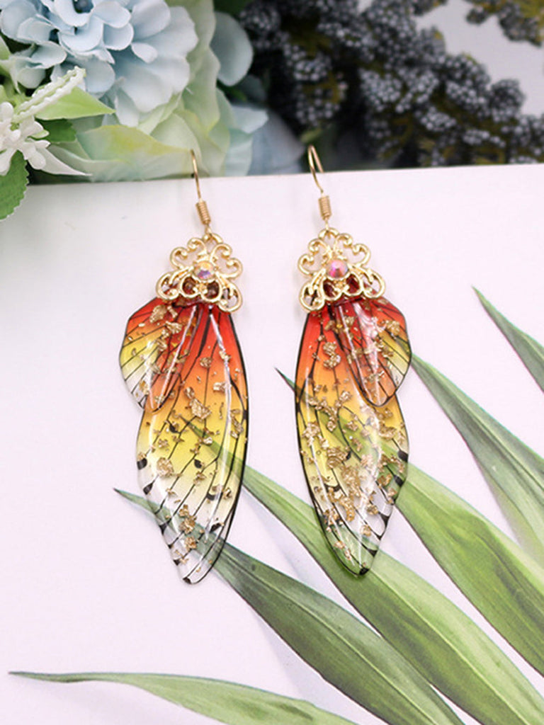 Boucles d'oreilles en cristal d'aile de cigale avec strass jaunes et ailes de papillon