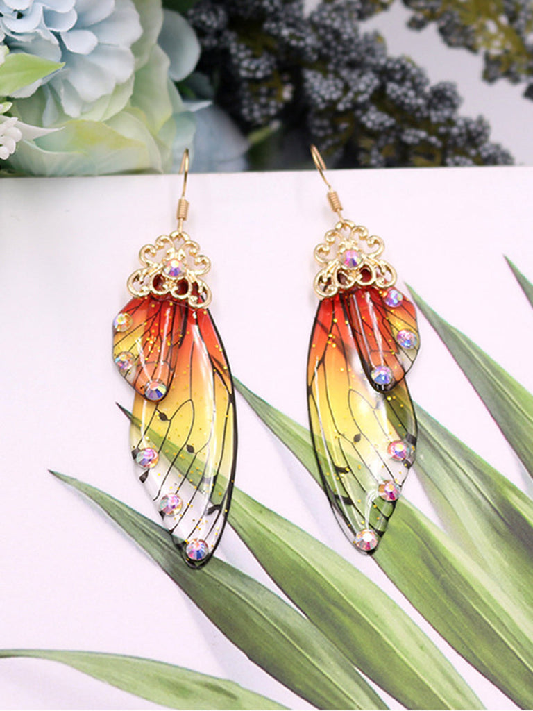 Boucles d'oreilles en cristal d'aile de cigale avec strass jaunes et ailes de papillon