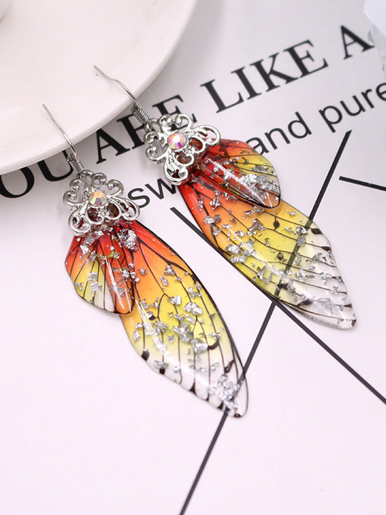 Boucles d'oreilles en cristal d'aile de cigale avec strass jaunes et ailes de papillon