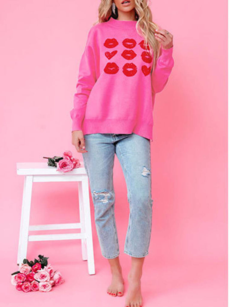 Pull en tricot avec cœur et lèvres de la Saint-Valentin