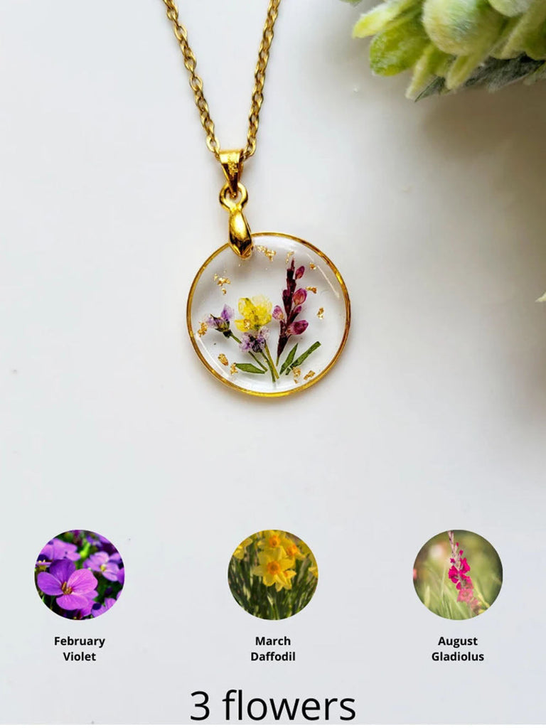 Colliers pendentifs en résine pressée avec bouquet de fleurs de naissance faits à la main