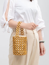 Load image into Gallery viewer, Hollowed-Out Wooden Bead Woven Bucket Bag