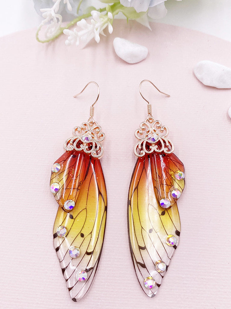 Boucles d'oreilles en cristal d'aile de cigale avec strass jaunes et ailes de papillon