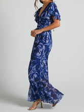 Indlæs billede til gallerivisning V Neck Flutter Sleeve Maxi Dress In Navy Swirl