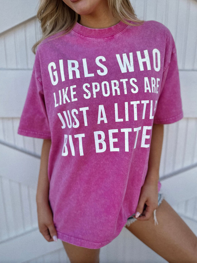 T-shirt rose délavé « Les filles qui aiment le sport sont un peu meilleures »