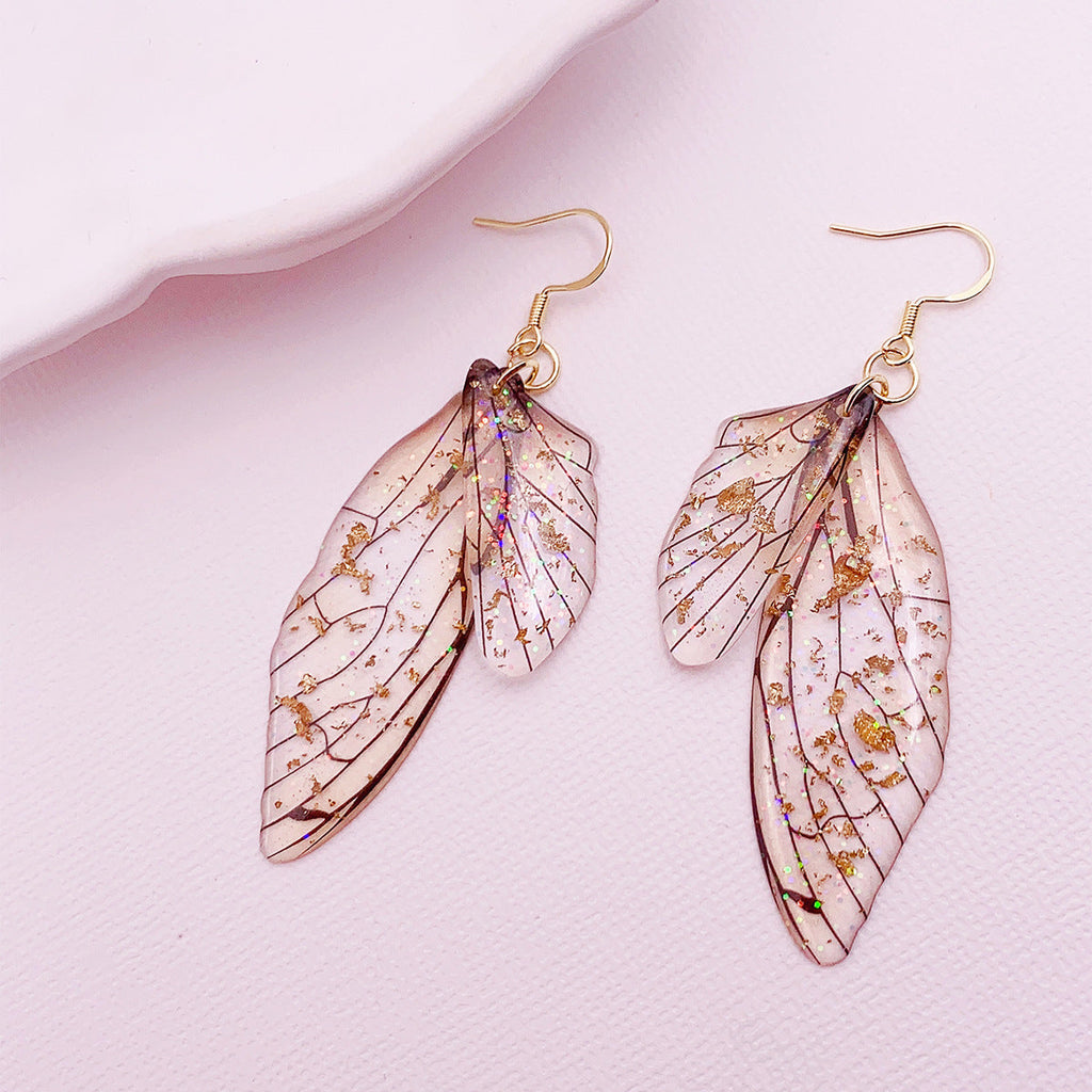 Boucles d'oreilles faites main en forme d'ailes de papillon 