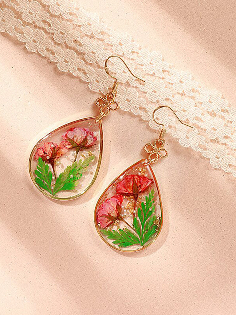 Boucles d'oreilles pendantes en résine rose rouge