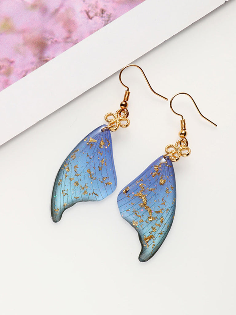 Boucles d'oreilles en époxy avec ailes de papillon colorées en feuille d'or