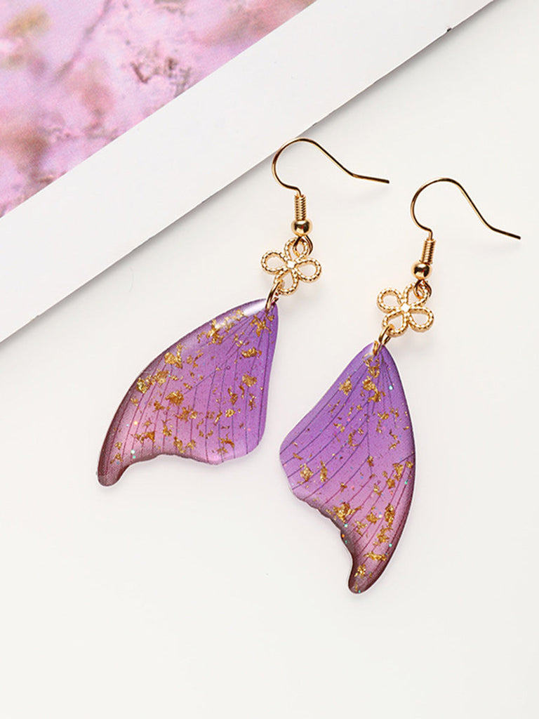 Boucles d'oreilles en époxy avec ailes de papillon colorées en feuille d'or