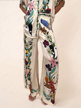 Indlæs billede til gallerivisning Satin Unique Print Pocketed Wide Leg Pants