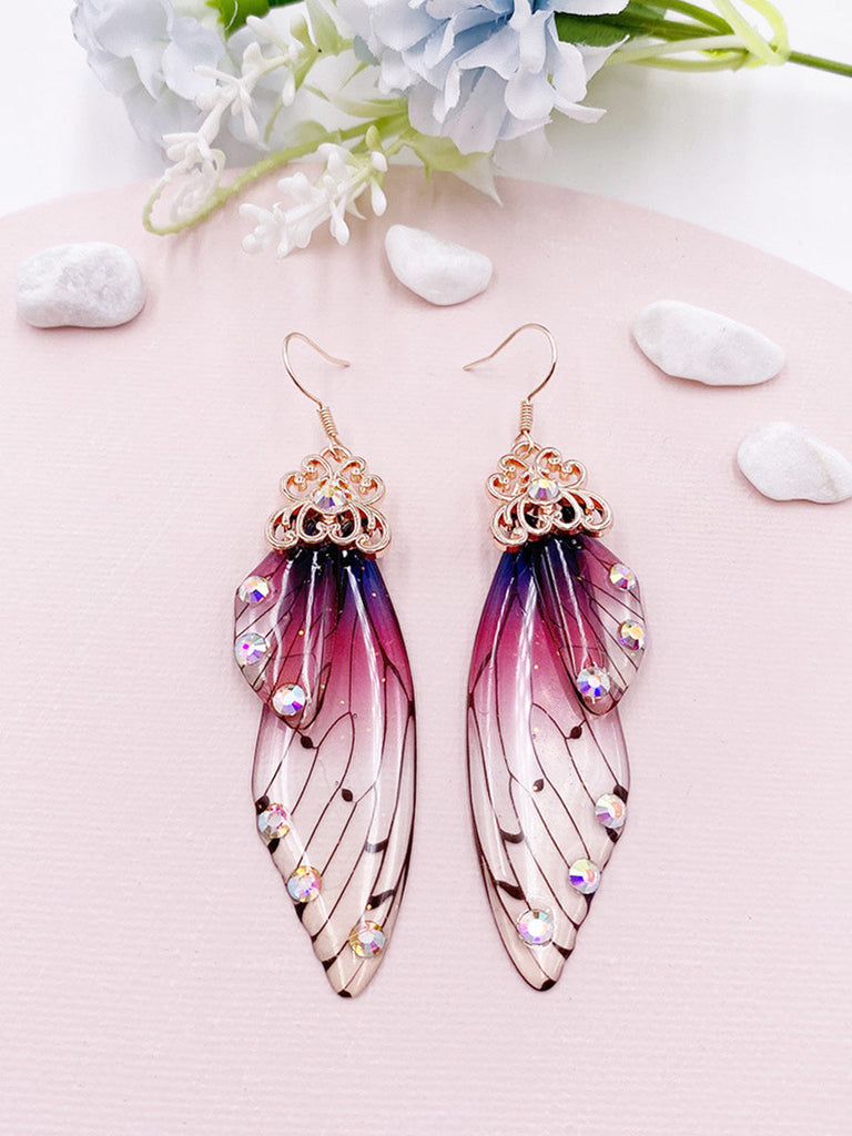 Boucles d'oreilles ailes de papillon en cristal violet avec strass et ailes de cigale