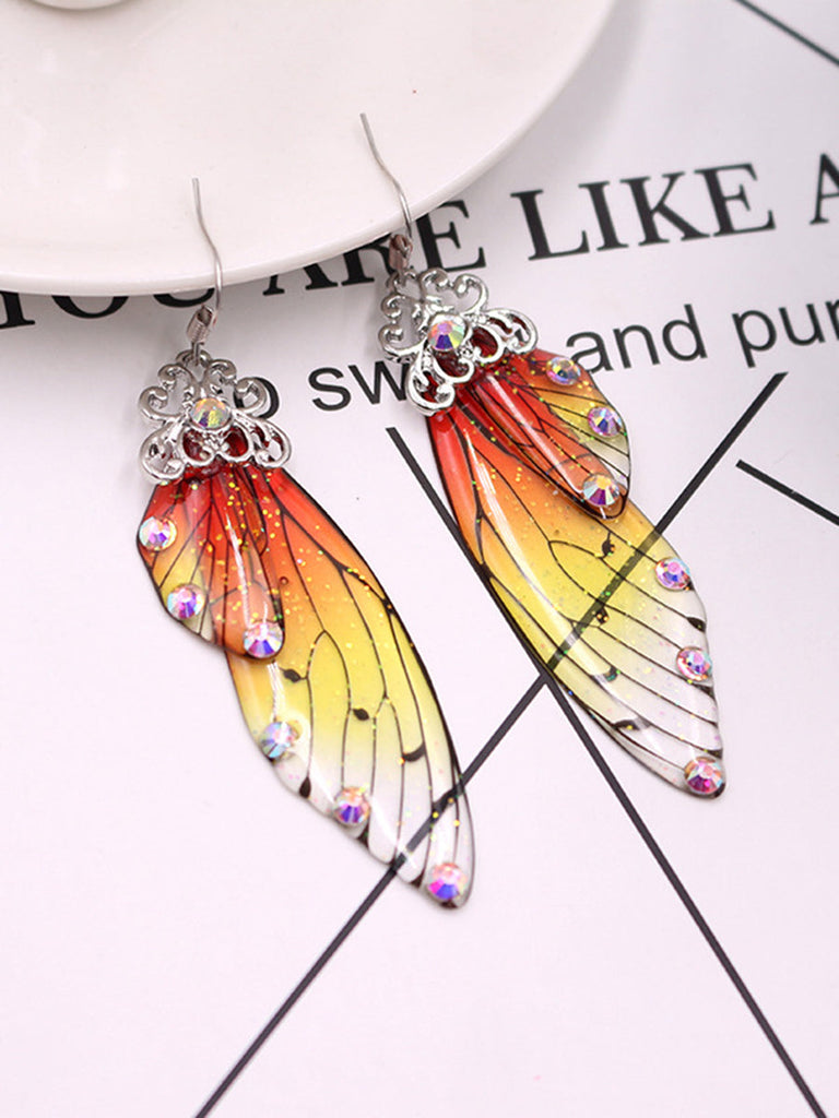 Boucles d'oreilles en cristal d'aile de cigale avec strass jaunes et ailes de papillon