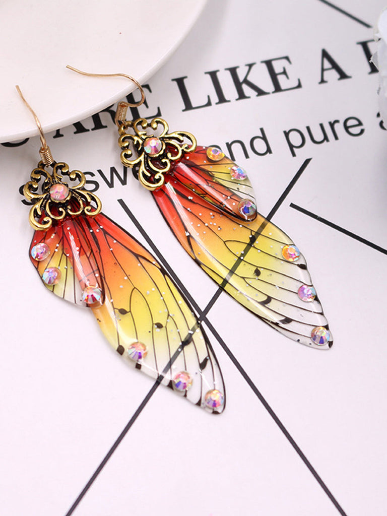 Boucles d'oreilles en cristal d'aile de cigale avec strass jaunes et ailes de papillon